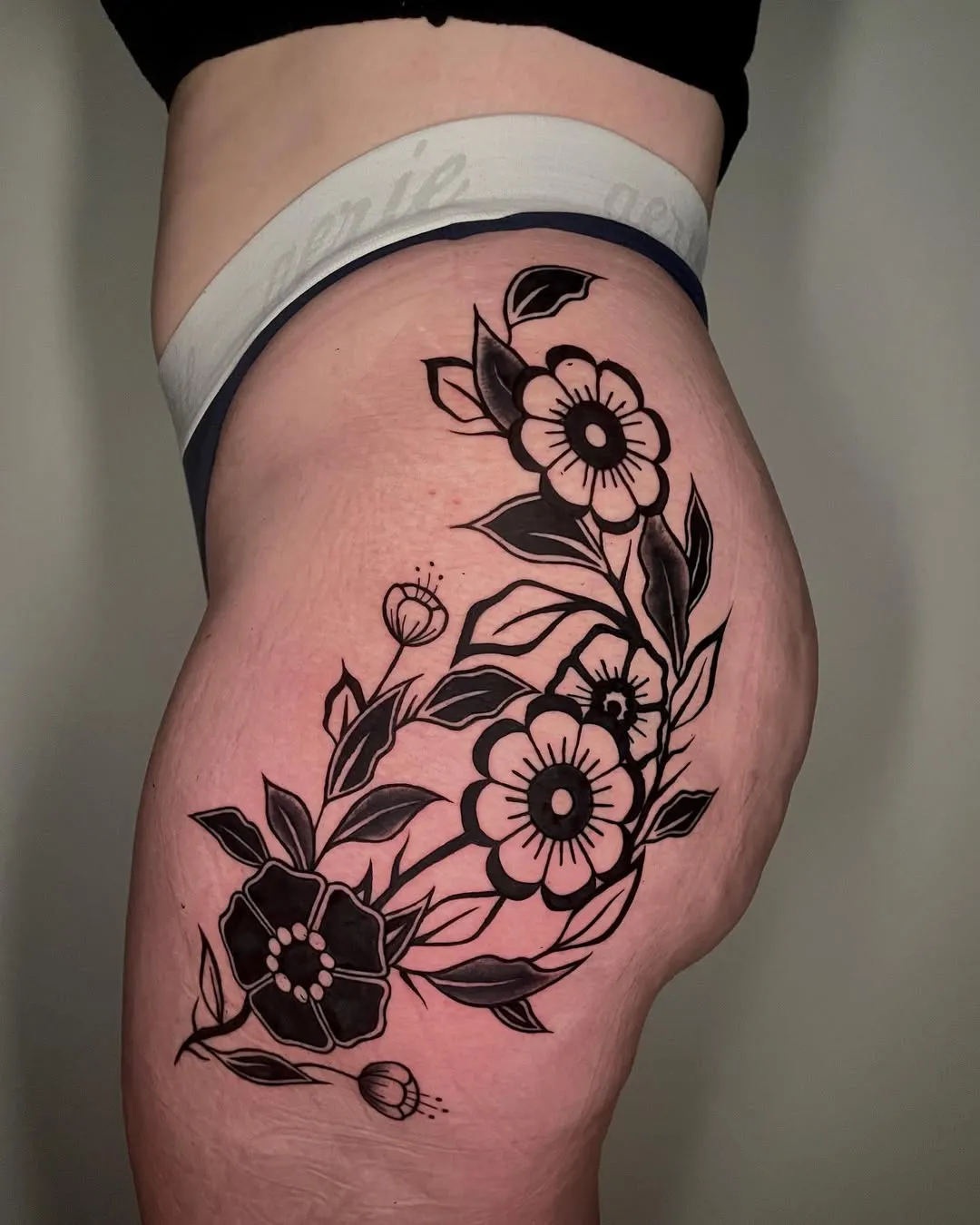 molly-kelso-traditional-blackwork-floral-tattoo-artist-chicago
