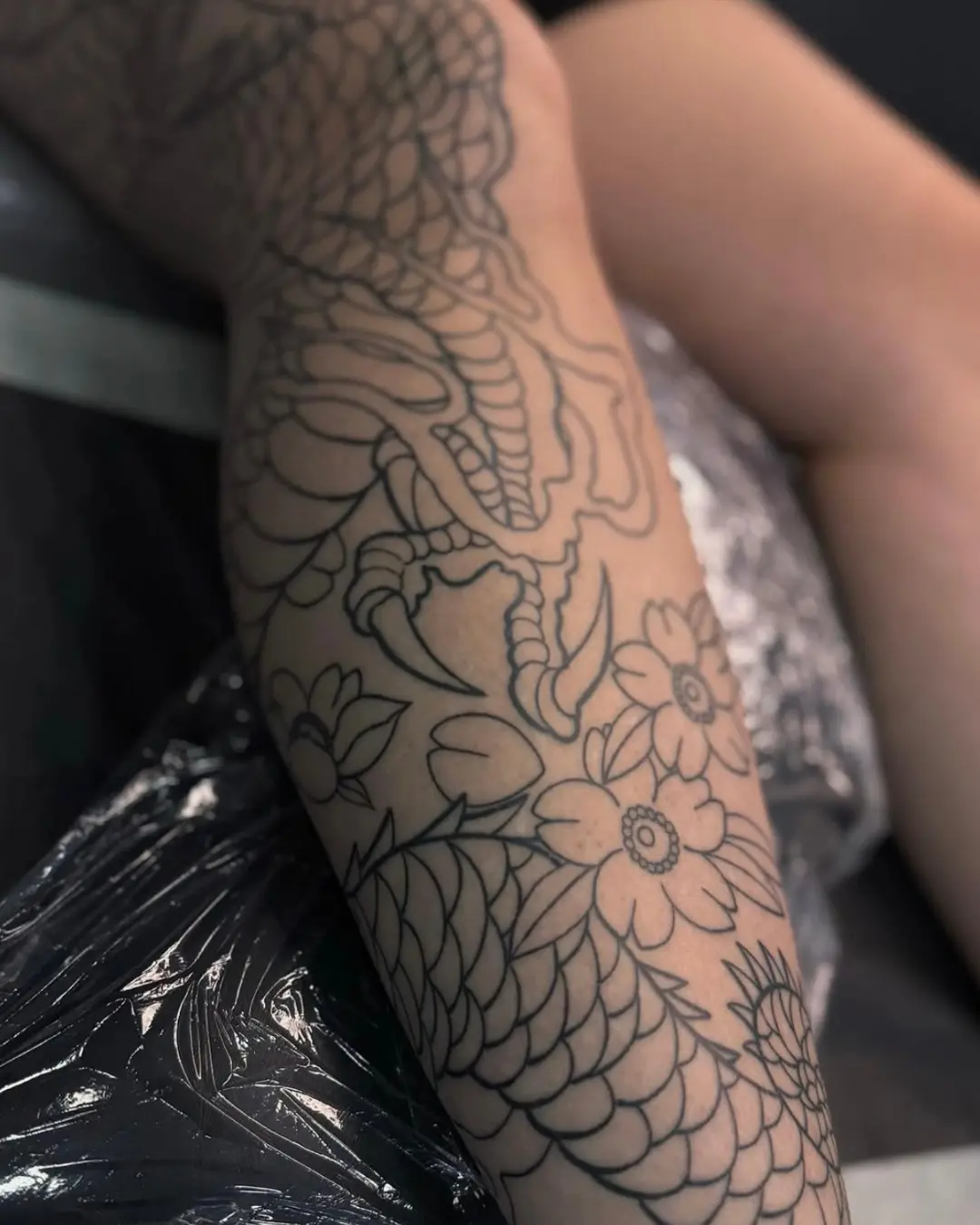 Japanese tattoos Chicago dragon sleeve tattoo embodying power and wisdom Japanese tattoos Chicago dragon sleeve tattoo embodying power and wisdom