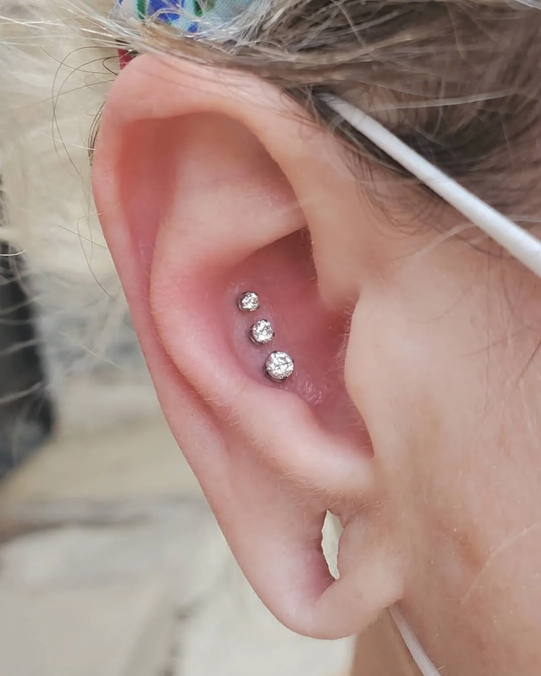 body-piercing-conch-triple-cz-ear-piercing-chicago-piercing-shops body piercing conch triple cz ear piercing chicago piercing shops